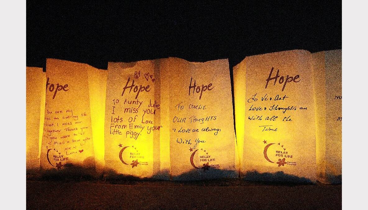 Handwritten candle bags at the Candlelight Ceremony of Hope.
