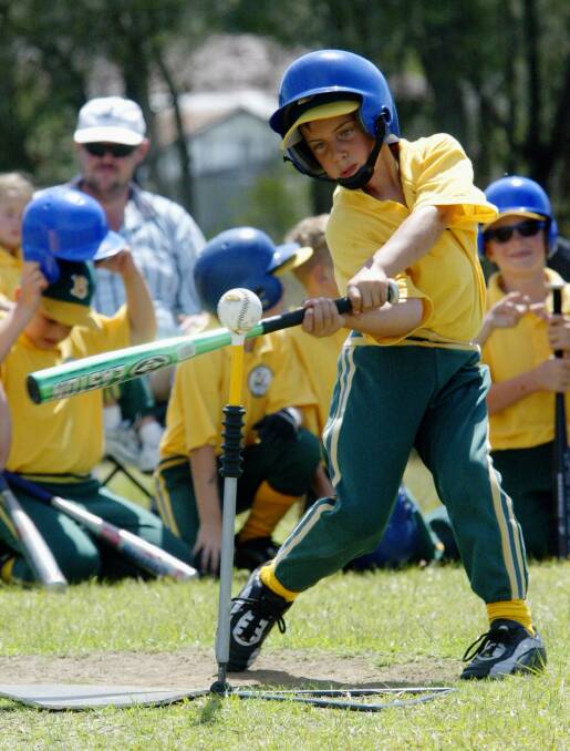 Berkeley Eagles U9s player Ryan Troiano takes a swing at the ball during his team's win 27-9 win over Dapto Panthers.