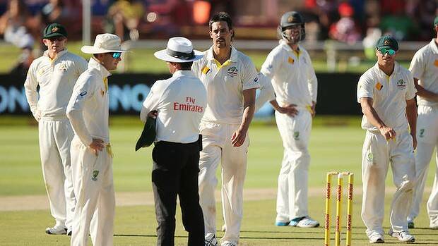 Michael Clarke and Mitchell Johnson remonstrate with umpire Aleem Dar after a review decision. Picture: GETTY IMAGES