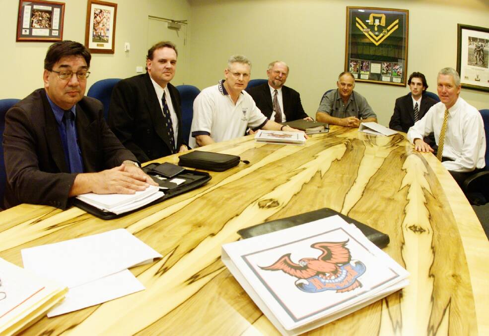 2003: At a Hawks board meeting.