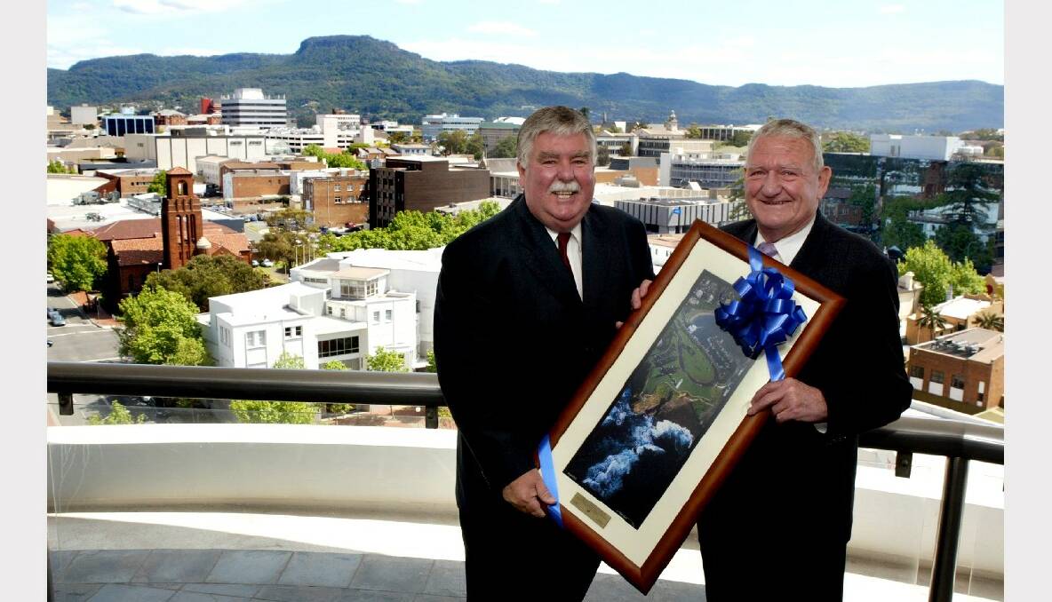 Minister for the Illawarra David Campbell was presented with an aerial photograph of Wollongong by Lord Mayor Alex Darling.