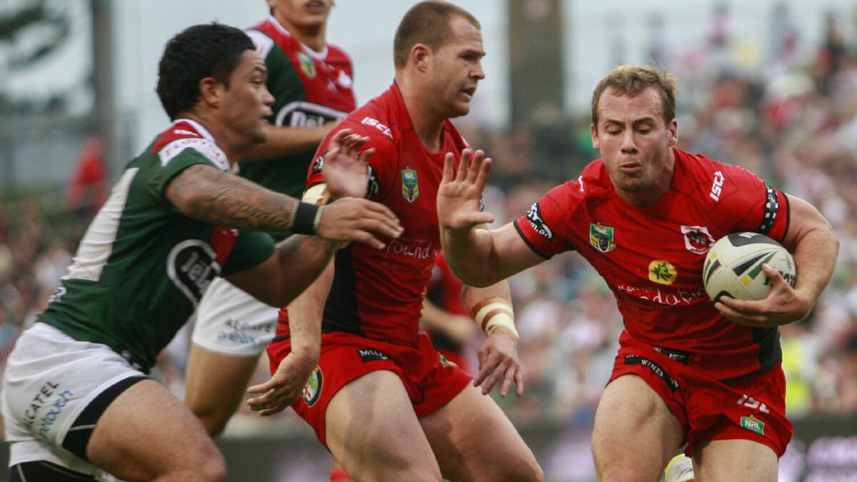 Dragons fullback Adam Quinlan, right, one of the youngest players in one of the youngest NRL teams named for round one. 