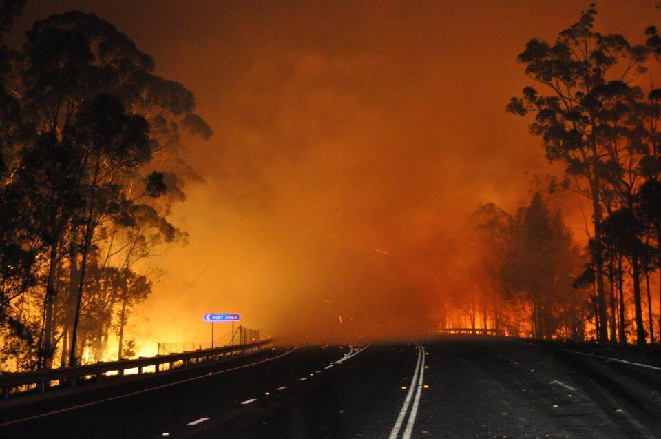 The fire at Deans Gap crossing the Princes Highway. Picture: NSW Rural Fire Service