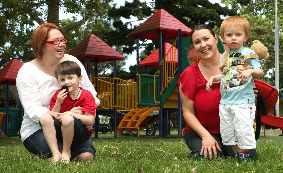 Luke Rapley with mum Rita and Jade Webb with son Callum, 4. Picture: KIRK GILMOUR
