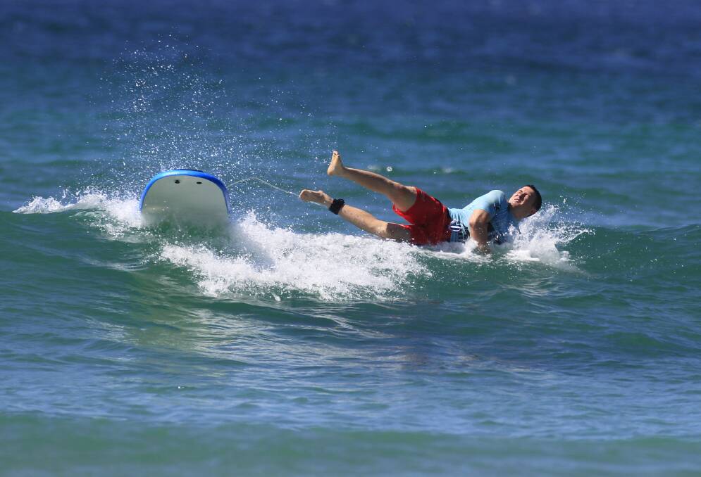 The Hawks get a lesson at surfing school. Picture: ANDY ZAKELI