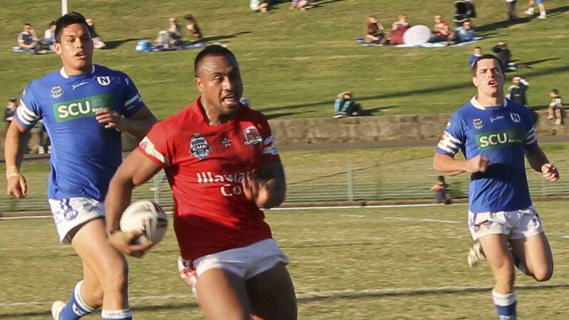 Cutters forward Atelea Vea on his way to scoring a try against Newtown in August.