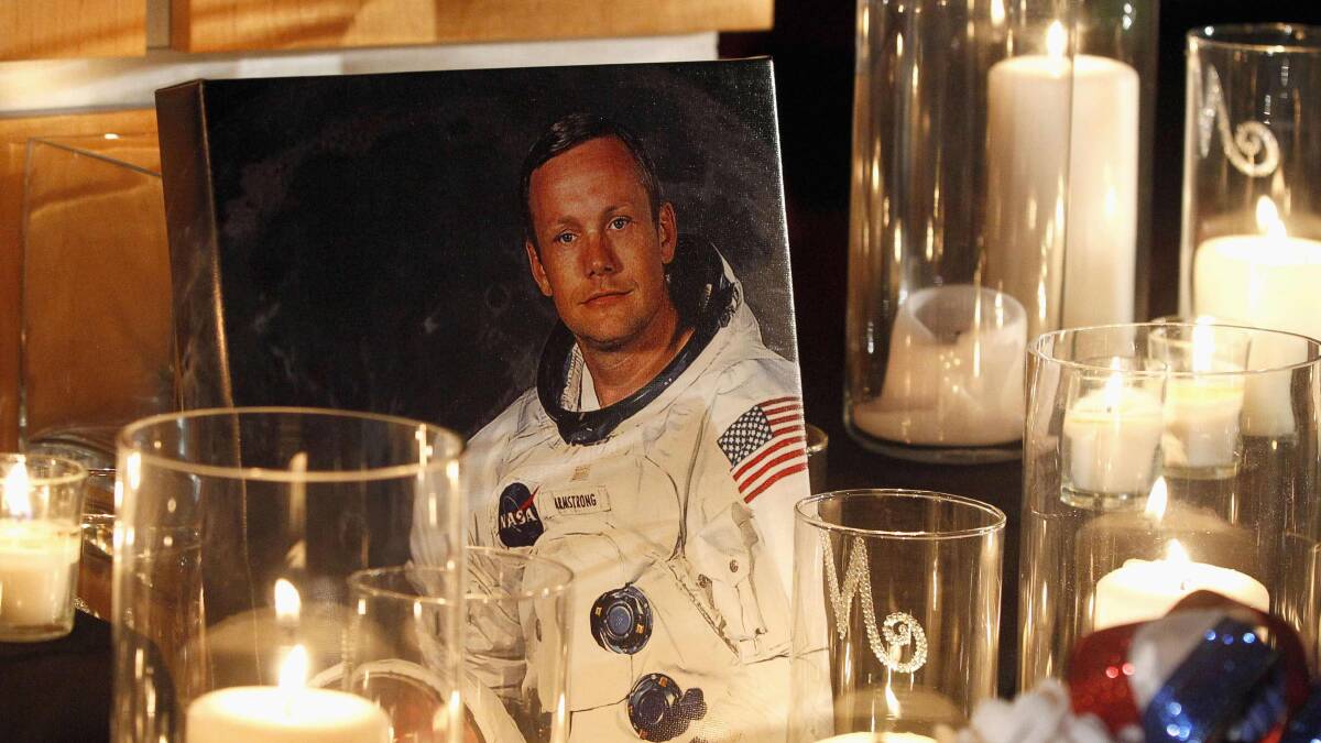A portrait of Neil Armstrong is displayed during a public memorial service at the Armstrong Air and Space Museum in Ohio. Picture: REUTERS