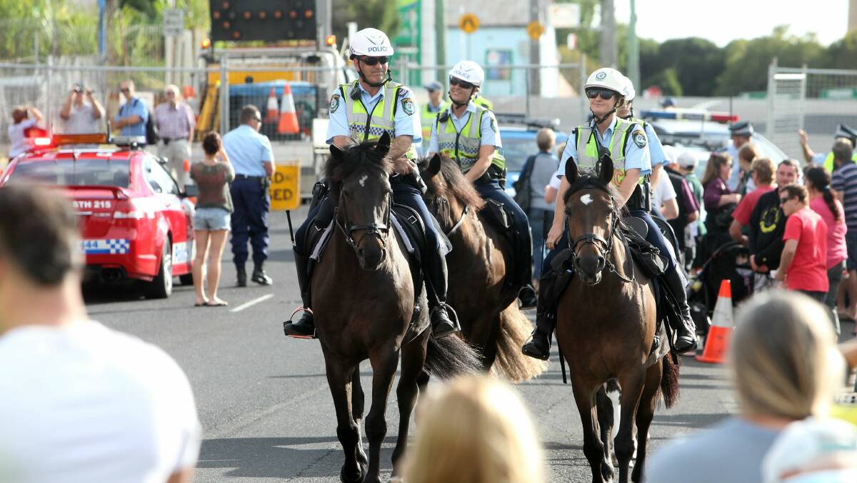 A police horseback patrol in the streets of Port Kembla. Picture: GREG TOTMAN