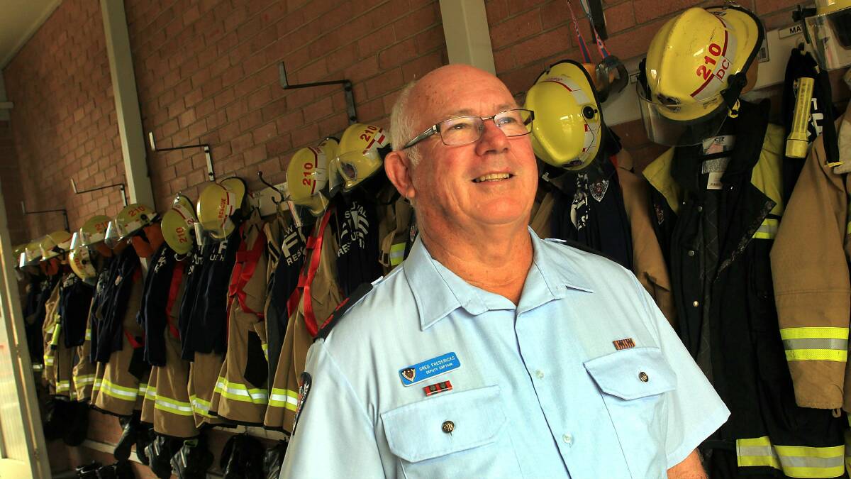 Balgownie Fire Station acting captain Greg Fredericks received an Australian Fire Service Medal. Picture: ORLANDO CHIODO
