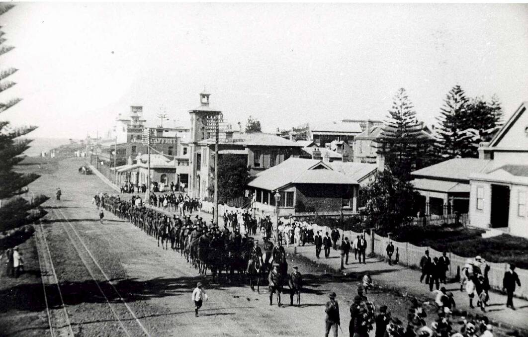 A procession up Terralong Street during World War I.