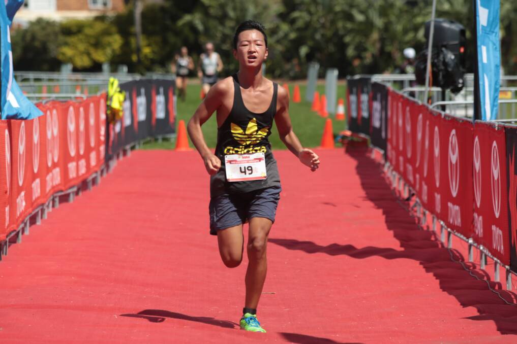 Justin Chin takes part in the Trithegong KidzWish Fun Run at Wollongong. Picture: ADAM McLEAN
