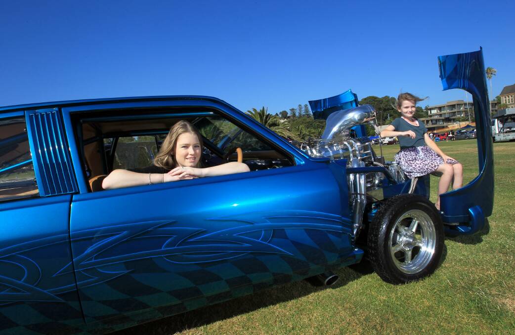 Sisters Emma and Amber with their father's Torana at the South Coast Showdown. Picture: ORLANDO CHIODO