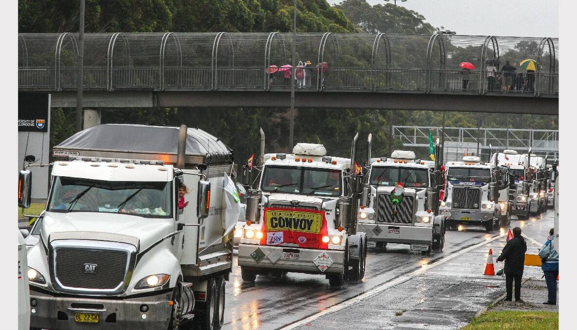 Trucks on Mount Ousley Road for the 2013 i98FM Camp Quality Convoy for Kids. Picture: ADAM McLEAN