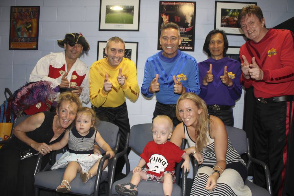 Dane Aronsten and twin sister Remi meet the Wiggles on Wednesday. 