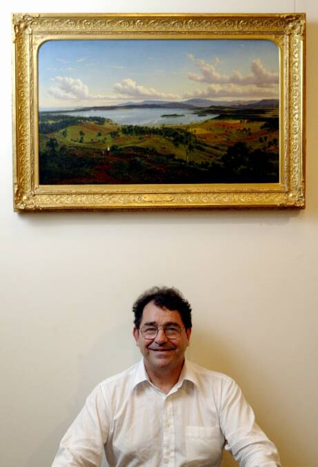 Wollongong City Gallery director Peter O’Neill with Eugene Von Guerard’s View of Lake Illawarra with Distant Mountains of Kiama.