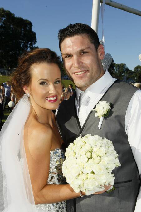 April 13: Amy Walsh and Jamie Dunning were married at Albion Park Rugby League Football Grounds.
