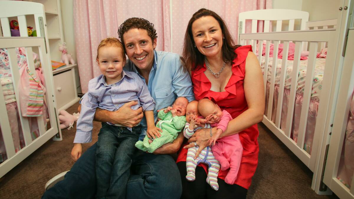 The triplets at home with parents Peter and Ally, and big brother Fraser.