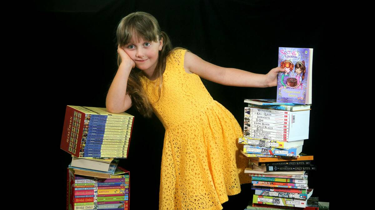 Shellharbour Public School student Annabelle King excels at reading. Picture: SYLVIA LIBER