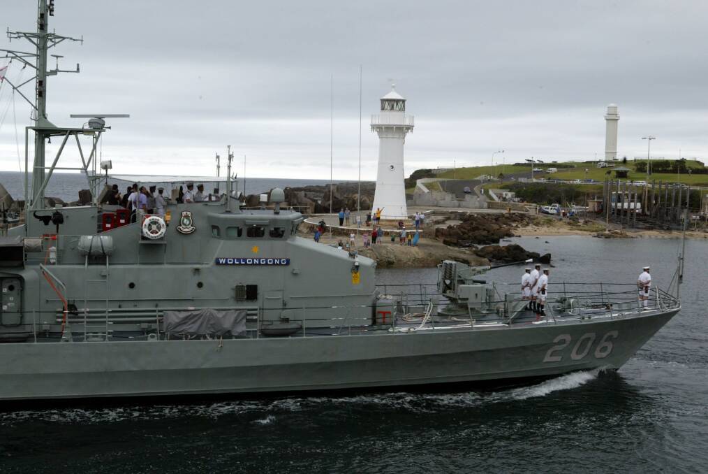 HMAS Wollongong steams into Belmore Basin to celebrate Australia Day.