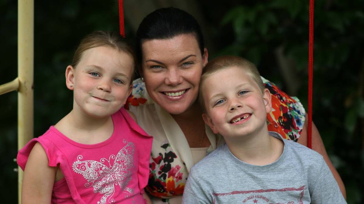 Therese Barclay, of Thirroul, with her daughter Alicia, 6, and son Liam, 7.GREG TOTMAN