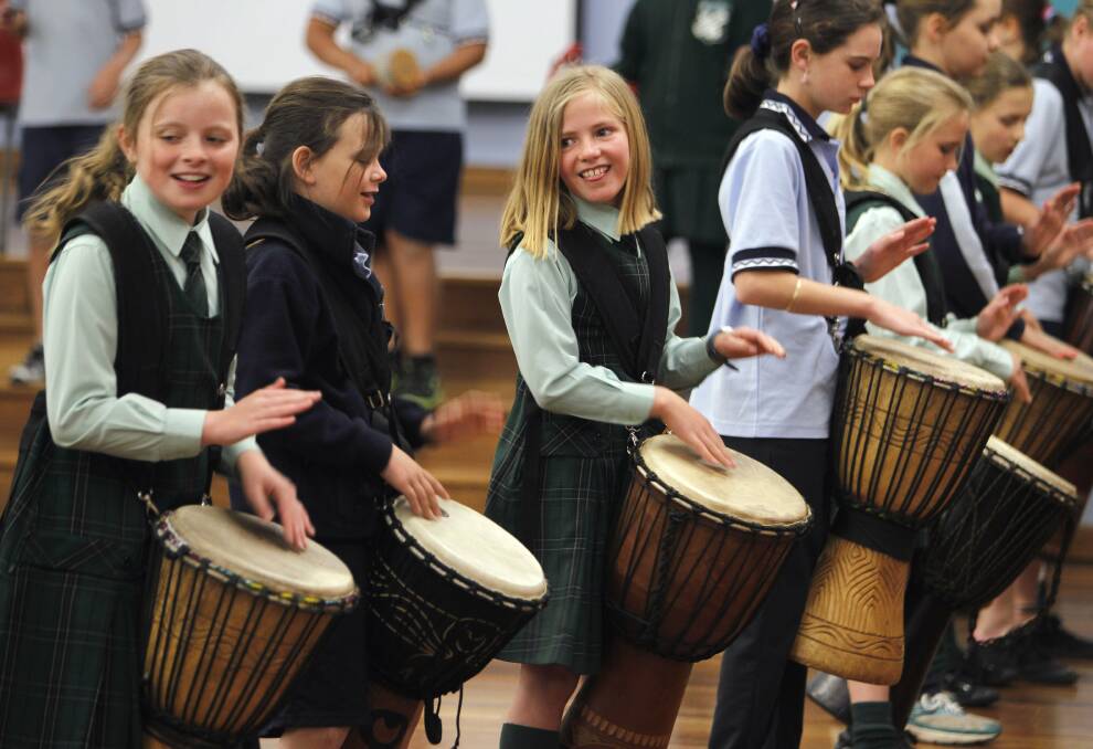 Students drumming to the beat of George Michael hit