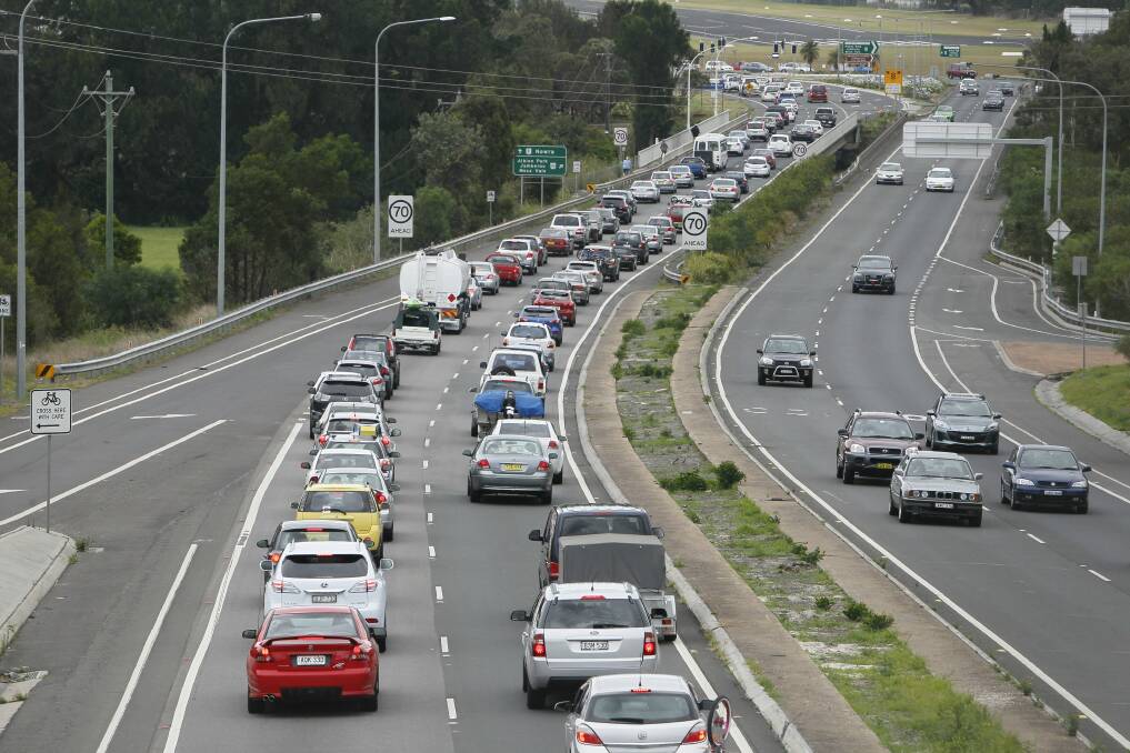 Traffic banks up on the Princes Highway at Haywards Bay at lunchtime yesterday. Picture: DAVID TEASE