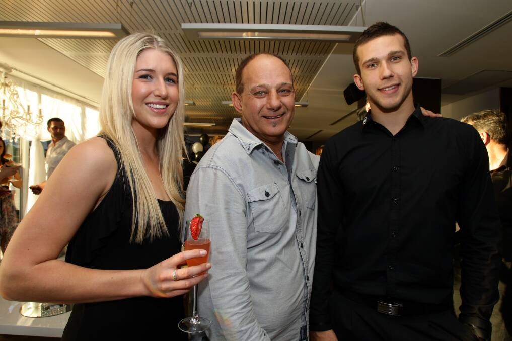October 2011: Kobi Ruzzene with Kon and Tyson Demos at the opening of Gigi's. 