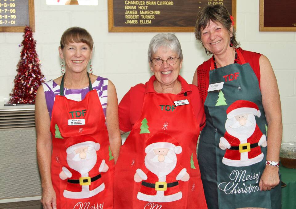 Margaret Willis, Robyn Baxter and Narelle Silver at the DENNY Foundation's Christmas Day lunch. Picture: GREG ELLIS