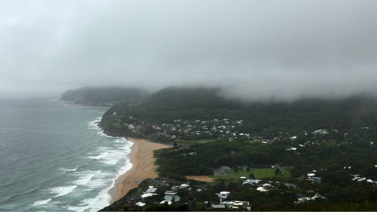 The view from Bald Hill at Stanwell Tops as a fog decends on the escarpment on Friday morning. Pictures: KIRK GILMOUR 