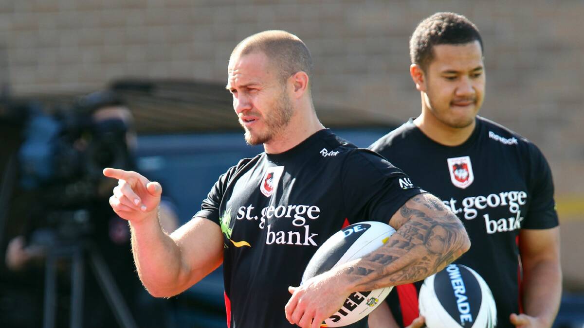  Matt Cooper speaks out at Dragons training yesterday. Pictures: KEN ROBERTSON