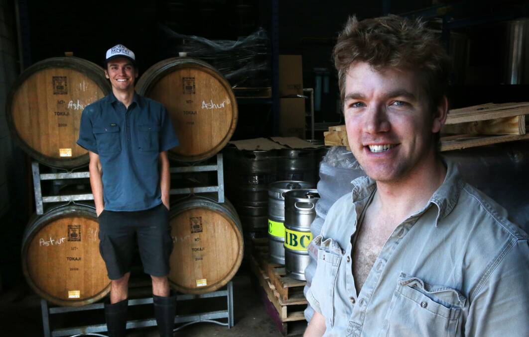 Illawarra Brewing Company brewers Shaun Blissett (rear) and Ashur Hall. Picture: KIRK GILMOUR