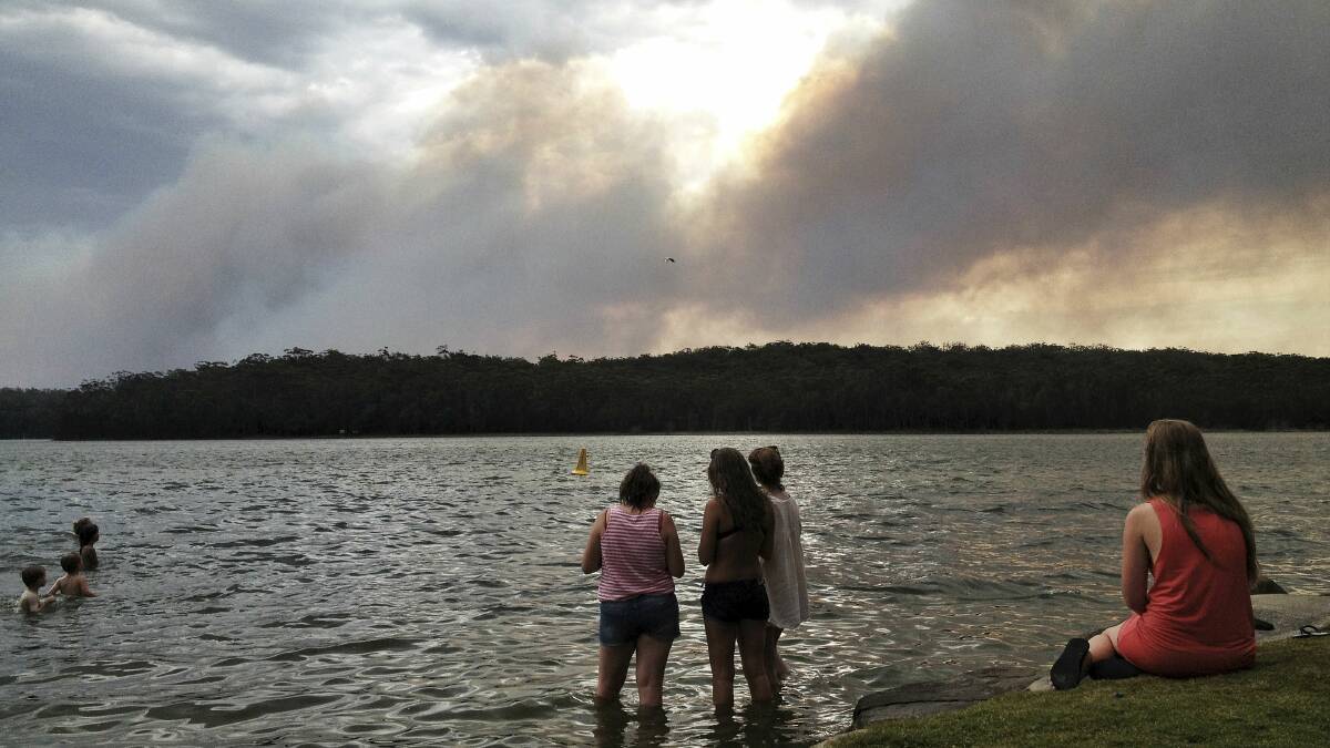View of the fire at Wandandian from Lake Conjola. Picture: DYLAN ROBINSON 