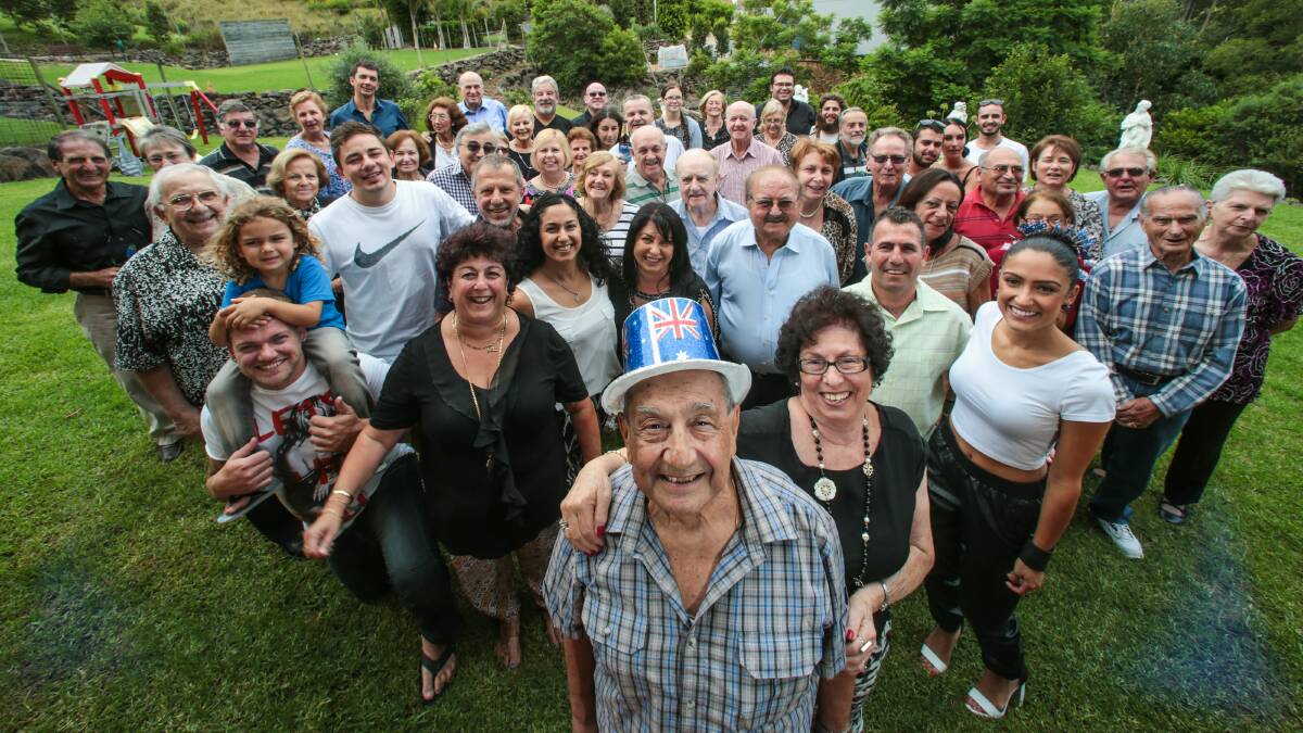 Paul Stylis with wife Maria, friends and family in Figtree for his 80th birthday. Picture: ADAM McLEAN