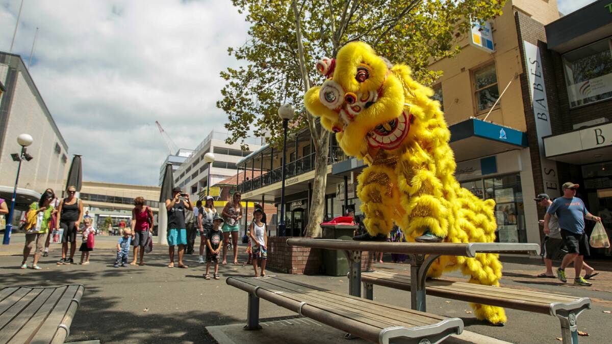 Lion dancing in Crown Street as part of Chinese New Year celebrations in Wollongong. Picture: CHRISTOPHER CHAN