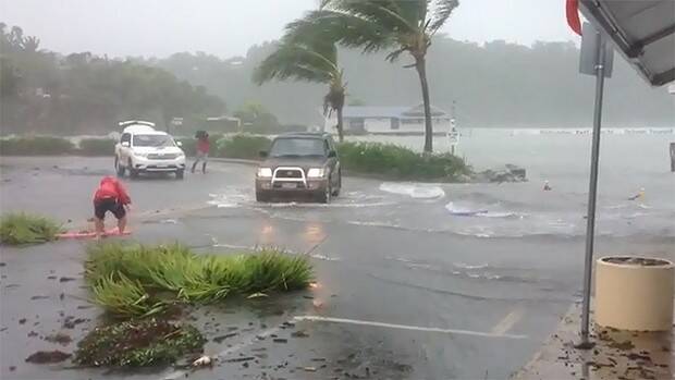 The storm surge at Shute Harbour on Thursday. Photo: YouTube. 