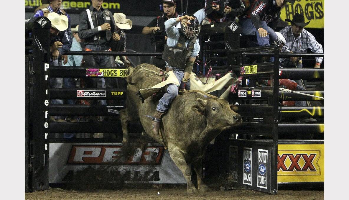 Matt Boland rides in the Professional Bull Riding competition at the WEC. Picture: SYLVIA LIBER 