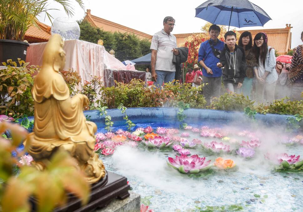 Visitors enjoy the sights of Nan Tien’s annual cultural festival. Picture: CHRISTOPHER CHAN