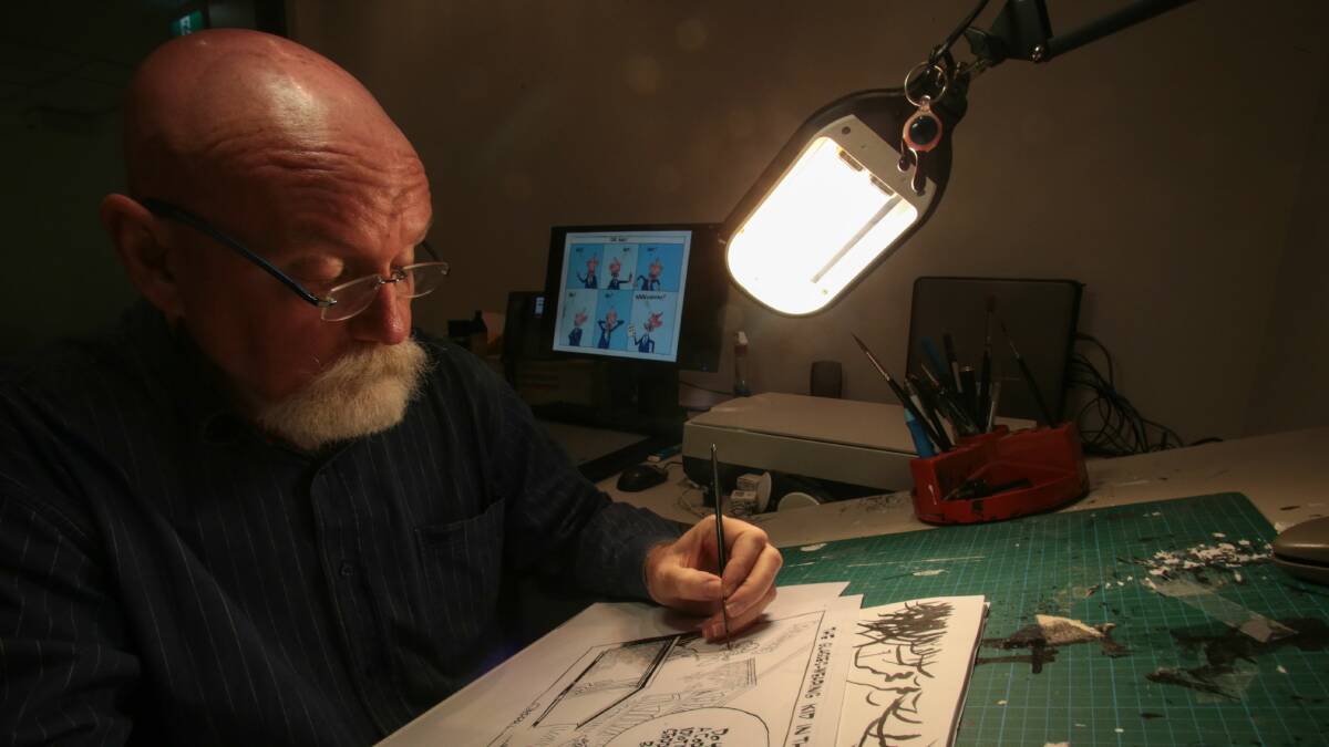 Cartoonist Vince O'Farrell at work. Picture: ADAM McLEAN