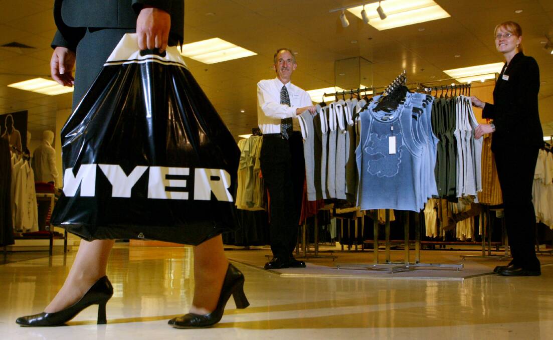 Myer Wollongong sales assistants Gregory Piper and Sandra Cooper will help to change the ticketing and signage as the store ceases trading as Grace Bros.