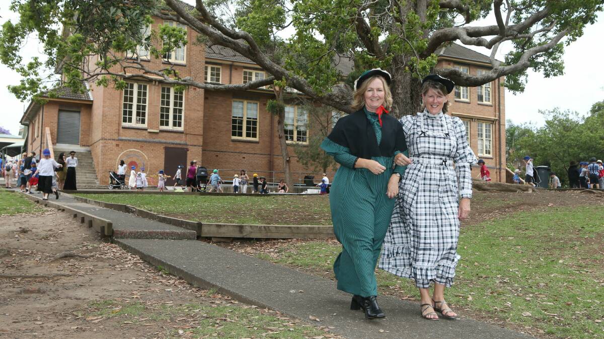 Woonona Public School teaching staff  Belinda Petrolo and Janine Fuller dressed in period costume.Pictures: KIRK GILMOUR