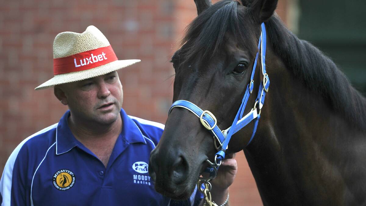 Black Caviar with trainer Peter Moody, who has hinted the horse's illustrious career could be coming to an end.