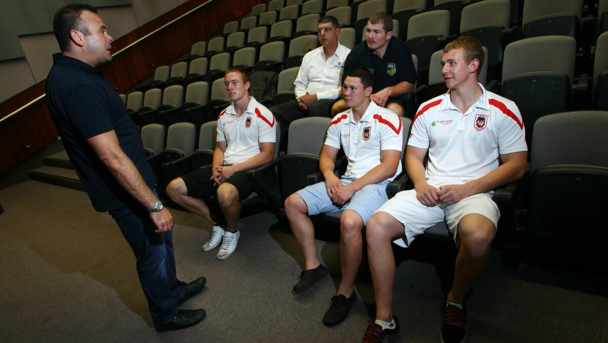 Rookie camp kicks off at the University of Wollongong as (from left) finance lecturer Sam Jebeile chats with Jack Stockwell, Canio Fierravanti, Logan Harris, NRL player welfare manager Andrew Ryan and Harry Stewart. Picture: KEN ROBERTSON