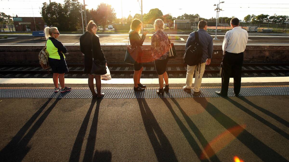 Scenes from Thirroul station during peak hour on Thursday morning. Pictures: KIRK GILMOUR