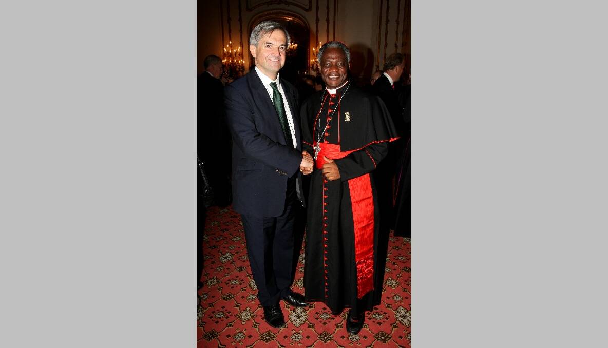 1. Cardinal Peter Turkson of Ghana (right).