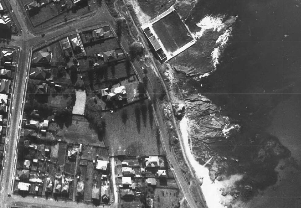 A 1938 aerial photo of North Wollongong shows the site of the Cliff Road Department of Housing unit complex vacant.