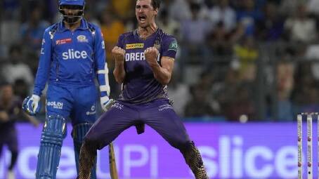 Mitchell Starc roars his delight after bowling Gerald Coetzee to win the IPL match for Kolkata. (AP PHOTO)